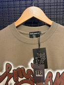 Camiseta Mixed Emotion Angel Brown Oversized - Pronta Entrega