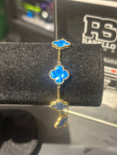 Pulseira Van Cleef Dourada Trevos Azuis 18 + 6 CM - Pronta Entrega